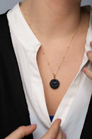 ONYX BUDDHA NECKLACE